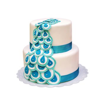 beautiful two-tiered cake with turquoise ribbons. isolated