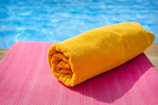 towel on a sunbed, beach