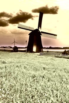 Landscape with Old Dutch Windmill at Sunset, Vintage Style Toned Picture