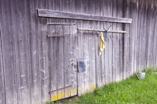 Old wooden unpainted barn wall in country