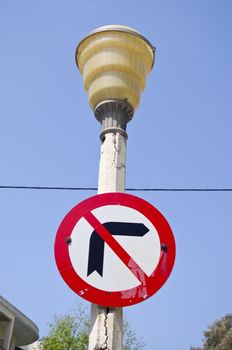 Roadsign on lamppost in Greece city street