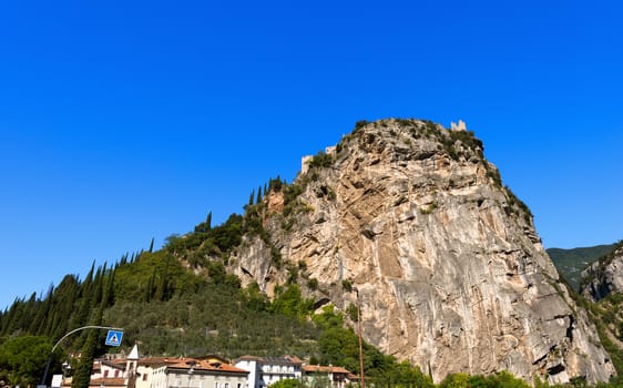 Rock walls with castle in Arco of Trento near the Garda Lake in Trentino Alto Adige, Italy, Europe
