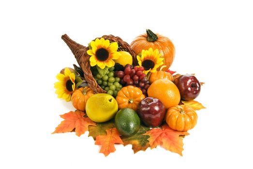 Beautiful and brightly colored fall cornucopia centerpiece arrangement