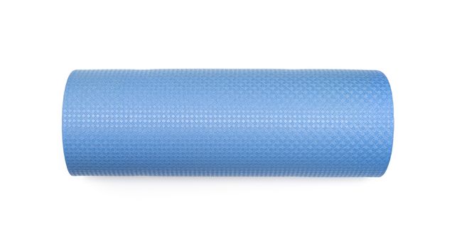 Blue yoga mat for exercise, isolated on white background.