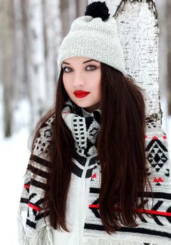 Young woman in a winter park
