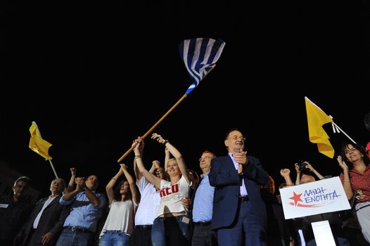 GREECE, Athens: Popular Unity party leader Panagiotis Lafazanis and other election candidates wave at supporters at the party's main pre-election rally in Athens on September 15, 2015. Greece's snap election takes place on September 20, with Syriza leader Alexis Tsipras and New Democracy's Evangelos Meimarakis the frontrunners.