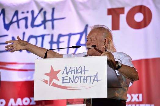 GREECE, Athens: Greek left-wing politician and World War Two resistance fighter Manolis Glezos addresses supporters of the Popular Unity party at its main pre-election rally in Athens on September 15, 2015. Greece's snap election takes place on September 20, with Syriza leader Alexis Tsipras and New Democracy's Evangelos Meimarakis the frontrunners.