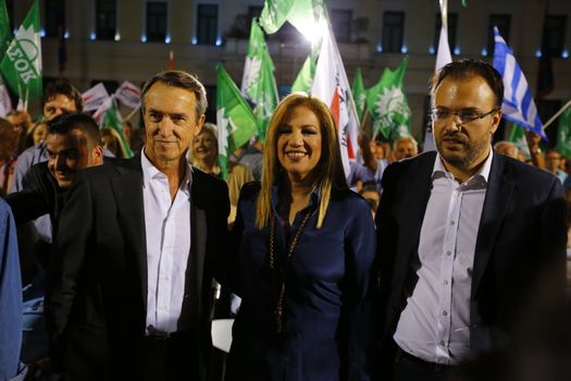 ATHENS, Greece: Coalition partner leaders Fofi Gennimata (m), president of Pasok (Panhellenic Socialist Movement) and Thanasis Theoharopoulos (r), the president of Democratic Left (DMIAR), were the main speakers at a Pasok election rally in Athens on September 15, 2015. Ruling coalition Syriza called a snap election for September 20 after political turmoil following the negotiation of a further bailout packages from Greece's creditors. 