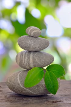  Stack of pebble on old wood