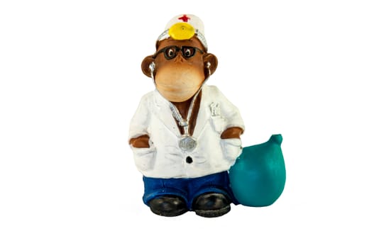 Figurine - Monkey doctor isolated on a white background