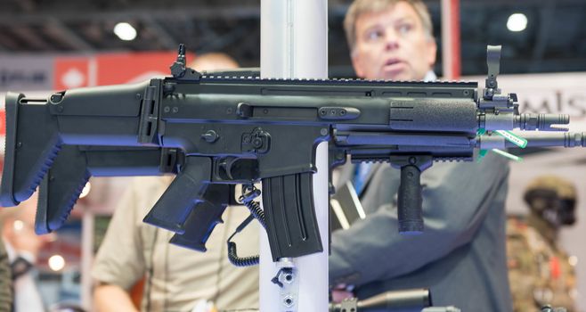 UNITED KINGDOM, London: Assault Rifle	The Defence and Security International Exhibition (DSEI) began in London on September 15, 2015 despite a week of direct action protests by peace campaigners.  	The arms fair has seen over 30,000 people descend on London to see the 1,500 exhibitors who are displaying weapons of war from pistols and rifles up to tanks, assault helicopters and warships.  	Protesters attempted to block the main road into the exhibition, claiming that such an event strengthened the UK's ties to human rights abuses. 