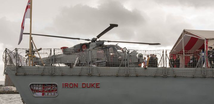 UNITED KINGDOM, London: Helicopter	The Defence and Security International Exhibition (DSEI) began in London on September 15, 2015 despite a week of direct action protests by peace campaigners.  	The arms fair has seen over 30,000 people descend on London to see the 1,500 exhibitors who are displaying weapons of war from pistols and rifles up to tanks, assault helicopters and warships.  	Protesters attempted to block the main road into the exhibition, claiming that such an event strengthened the UK's ties to human rights abuses. 