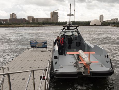 UNITED KINGDOM, London: Ship with drone/missile (?)	The Defence and Security International Exhibition (DSEI) began in London on September 15, 2015 despite a week of direct action protests by peace campaigners.  	The arms fair has seen over 30,000 people descend on London to see the 1,500 exhibitors who are displaying weapons of war from pistols and rifles up to tanks, assault helicopters and warships.  	Protesters attempted to block the main road into the exhibition, claiming that such an event strengthened the UK's ties to human rights abuses. 