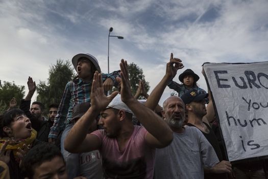 SERBIA, Horgos: Refugees demonstrate on the Serbian side of the Serbia-Hungary border after Hungary closed the border crossing on September 16, 2015.****Restriction: Photo is not to be sold in Russia or Asia****