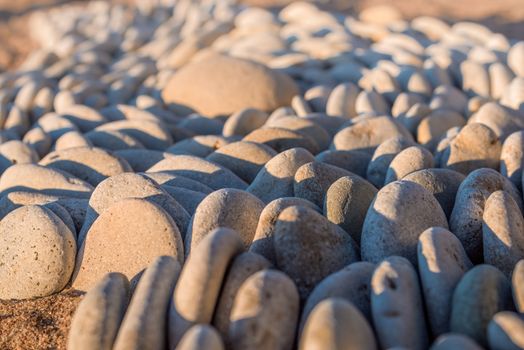 A lot pebbles around of big stone