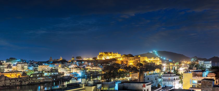 Udaipur, evening view of the city and City Palace complex. Udaipur, Rajasthan, India, Asia