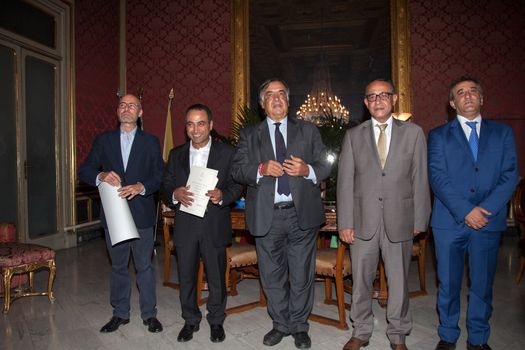 ITALY, Palermo: As the refugee crisis continues to grow in Europe, the Italian city of Palermo confers honorary citizenship to international organization Doctors Without Borders on September 16, 2015. Among those attending the ceremony were Ahmad Al Rousan, cultural mediator with Doctors Without Borders, and Leoluca Orlando, Italian politician and Palermo Mayor.