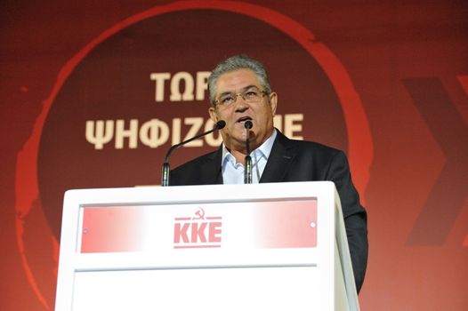 GREECE, Athens: General Secretary Dimitris Koutsoumpas of the Communist Party of Greece (KKE) speaks at a campaign rally in Athens on September 16, 2015, ahead of the forthcoming snap elections on September 20.