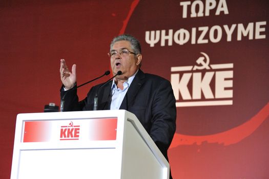 GREECE, Athens: General Secretary Dimitris Koutsoumpas of the Communist Party of Greece (KKE) speaks at a campaign rally in Athens on September 16, 2015, ahead of the forthcoming snap elections on September 20.