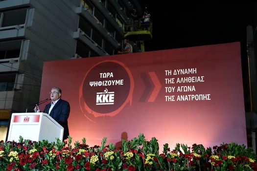 GREECE, Athens: General Secretary Dimitris Koutsoumpas of the Communist Party of Greece (KKE) speaks at a campaign rally in Athens on September 16, 2015, ahead of the forthcoming snap elections on September 20.