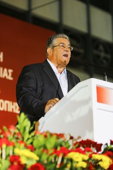 GREECE, Athens: General Secretary Dimitris Koutsoumpas of the Communist Party of Greece (KKE) speaks at a campaign rally at Syntagma Square in Athens on September 16, 2015, ahead of the forthcoming snap elections on September 20.