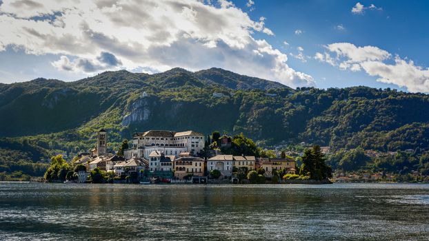 Lake Orta is known as the most romantic lake in Italy. 
located in Piedmont in northern Italy a few miles away from the largest and most famous lake Maggiore. 
In the middle of the lake there is the beautiful island of San Giulio.