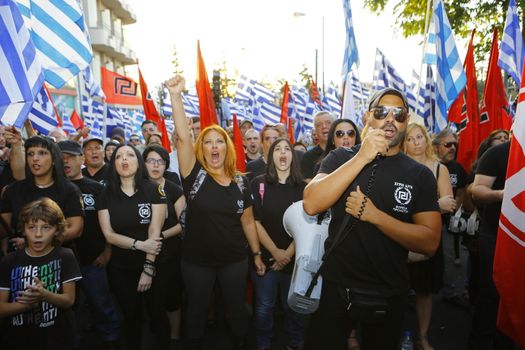 GREECE, Athens: A man shouts slogans to the crowd as Greece's far-right Golden Dawn party holds an election rally in Athens on September 16, 2015, four days ahead of the country's snap national election. 