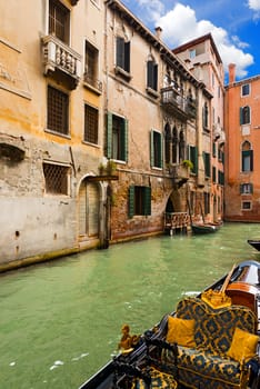 Romantic view of Venice with a canal and detail of a gondola. Venezia (UNESCO world heritage site), Veneto, Italy