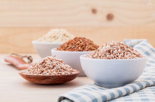 Whole grain Traditional Thai rice best rice for healthy and clean food in coconut wooden bowl .