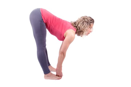 Woman making a yoga posture on a white background