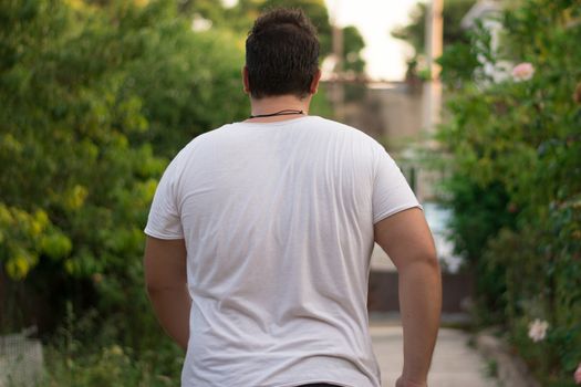 Young man walking away.