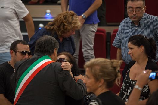 ITALY, Palermo: 	The funeral of Giovanni Lo Porto was held on September 18, 2015, with Mayor Leoluca�Orlando declaring a day of mourning in the city.  	Lo Porto, an aid worker, was being held captive by al-Qaida along with American Warren Weinstein.  	The pair were mistakenly killed during a U.S. drone strike in January. 