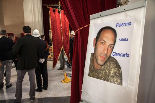 ITALY, Palermo: Image of Lo Porto	The funeral of Giovanni Lo Porto was held on September 18, 2015, with Mayor Leoluca�Orlando declaring a day of mourning in the city.  	Lo Porto, an aid worker, was being held captive by al-Qaida along with American Warren Weinstein.  	The pair were mistakenly killed during a U.S. drone strike in January. 