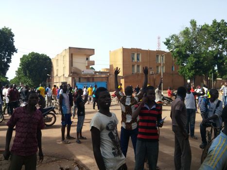 BURKINA FASO, Ouagadougou : Protestors react during a protest against the military coup near place de la Nation in Ouagadougou, Burkina Faso, on September 17, 2015. Protests have sparked in Ouagadougou after Presidential guard officers seized power in a coup. 