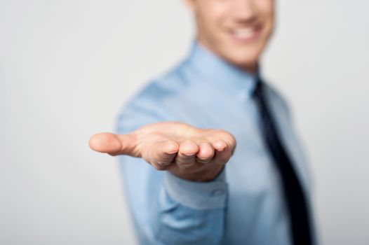 Close up image of executive showing empty palm