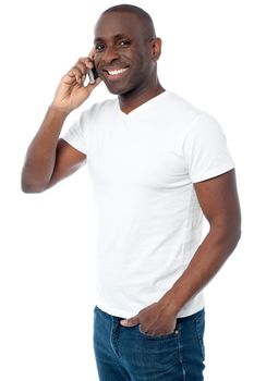 Side pose of middle aged man talking on cell phone