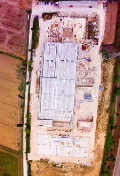 Aerial view of building construction site. Industrial environment.