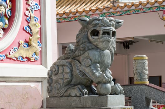 Close up of lion statue at China temple Chonburi, Thailand