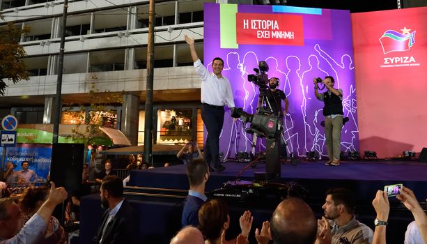 GREECE, Athens: Alexis Tsipras, former Prime Minister and leader of the Syriza party, waves at supporters during the party's main election campaign rally in Athens, Greece on September 18, 2015. The Greek General Election will be held on September 20