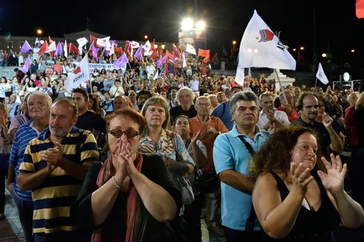 GREECE, Athens: Supporters of the Syriza party applaud during the party's main election campaign rally in Athens, Greece on September 18, 2015. The Greek General Election will be held on September 20