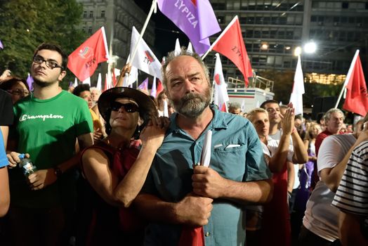 GREECE, Athens: Supporters of the Syriza party, listen to leader Alexis Tsipras during the party's main election campaign rally in Athens, Greece on September 18, 2015. The Greek General Election will be held on September 20