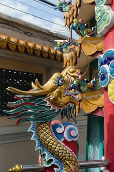 China Dragon statue in china temple roof shot  the beautiful reflected light.