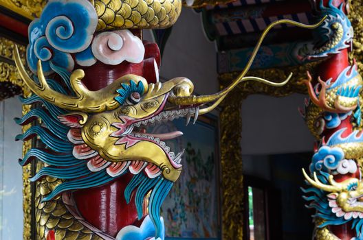 China Dragon statue in china temple roof shot  the beautiful reflected light.