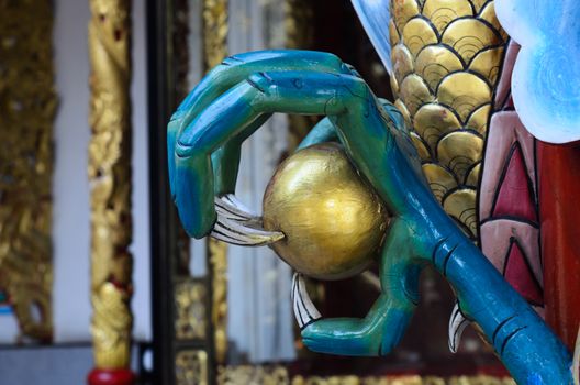 This decorative sculpture in china shows the detail of the dragon's clawed foot and expertise of the artist.