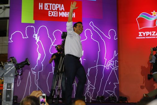 GREECE, Athens: Alexis Tsipras, former Prime Minister and current leader of Syriza, waves to the crowd of Syriza supporters during the party's final election rally at Syntagma Square, Athens on September 18, 2015 two days ahead of the Greek General Election