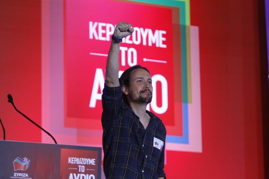 GREECE, Athens: Pablo Iglesias, the leader of the Spanish anti-austerity Podemos party, makes a clenched fist salute to Syriza supporters during the party's final election rally at Syntagma Square, Athens on September 18, 2015 two days ahead of the Greek General Election