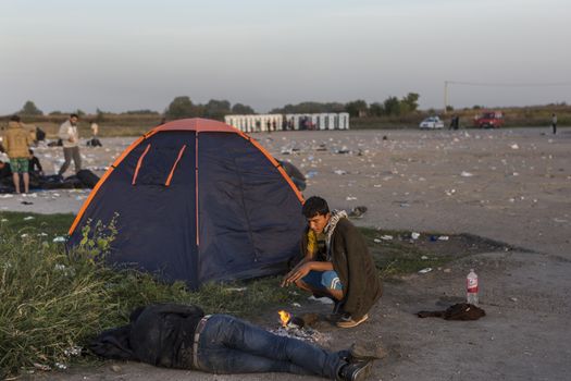 CROATIA, Tovarnik: Refugees camp out in Tovarnik, Croatia near the Serbian-border on September 18, 2015. Refugees are hoping to continue their journey to Germany and Northern Europe via Slovenia 