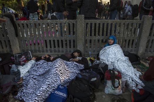CROATIA, Tovarnik: Refugees rest at the railway station in Tovarnik, Croatia near the Serbian-border on September 18, 2015. Refugees are hoping to continue their journey to Germany and Northern Europe via Slovenia 