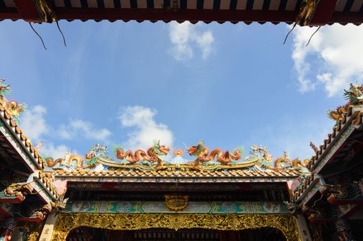 Various color dragons on blue sky , a city is Chon buri , Thailand