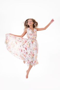 Young beautiful woman in fashinable long dress on isolated background